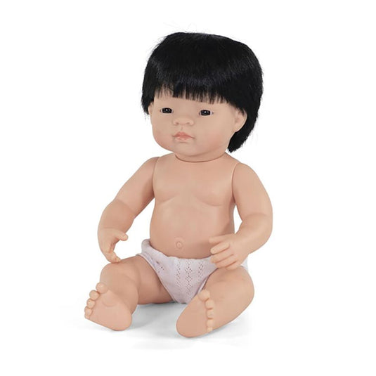 niño asiático muñeca